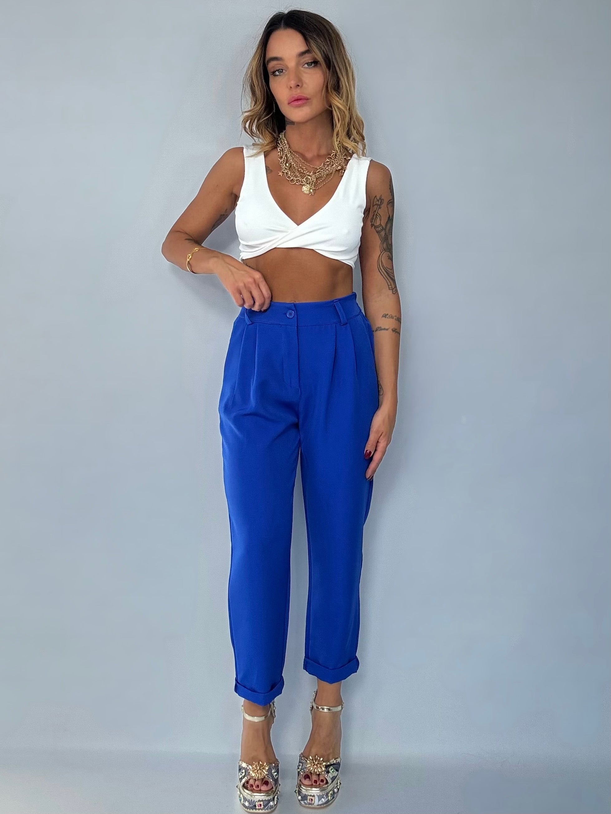 BLUZELLE – Overvest en geplooide broek voor moeiteloze elegantie